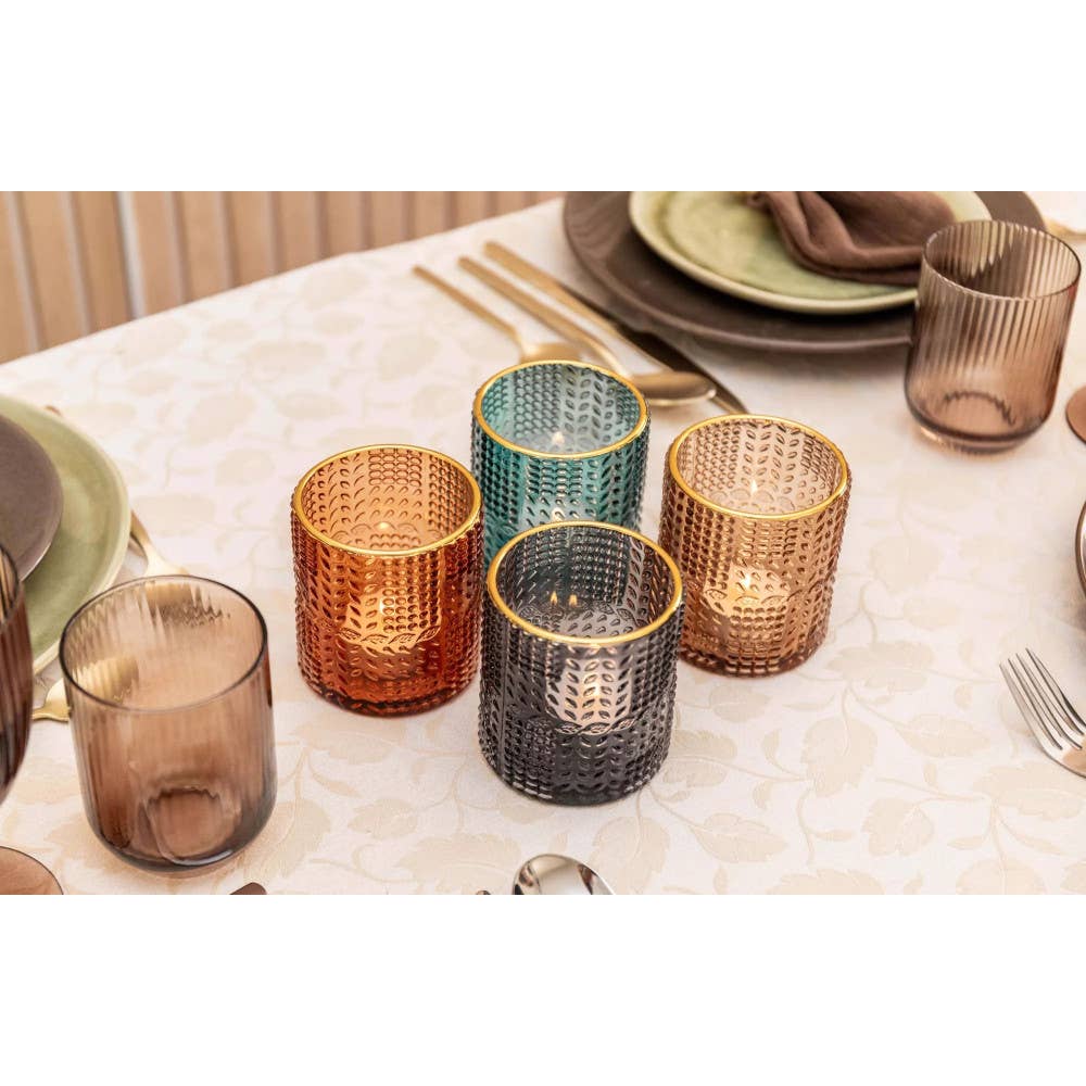 Juego de 4 portavelas de vidrio en 4 colores con bordes dorados 8x8x9 cm