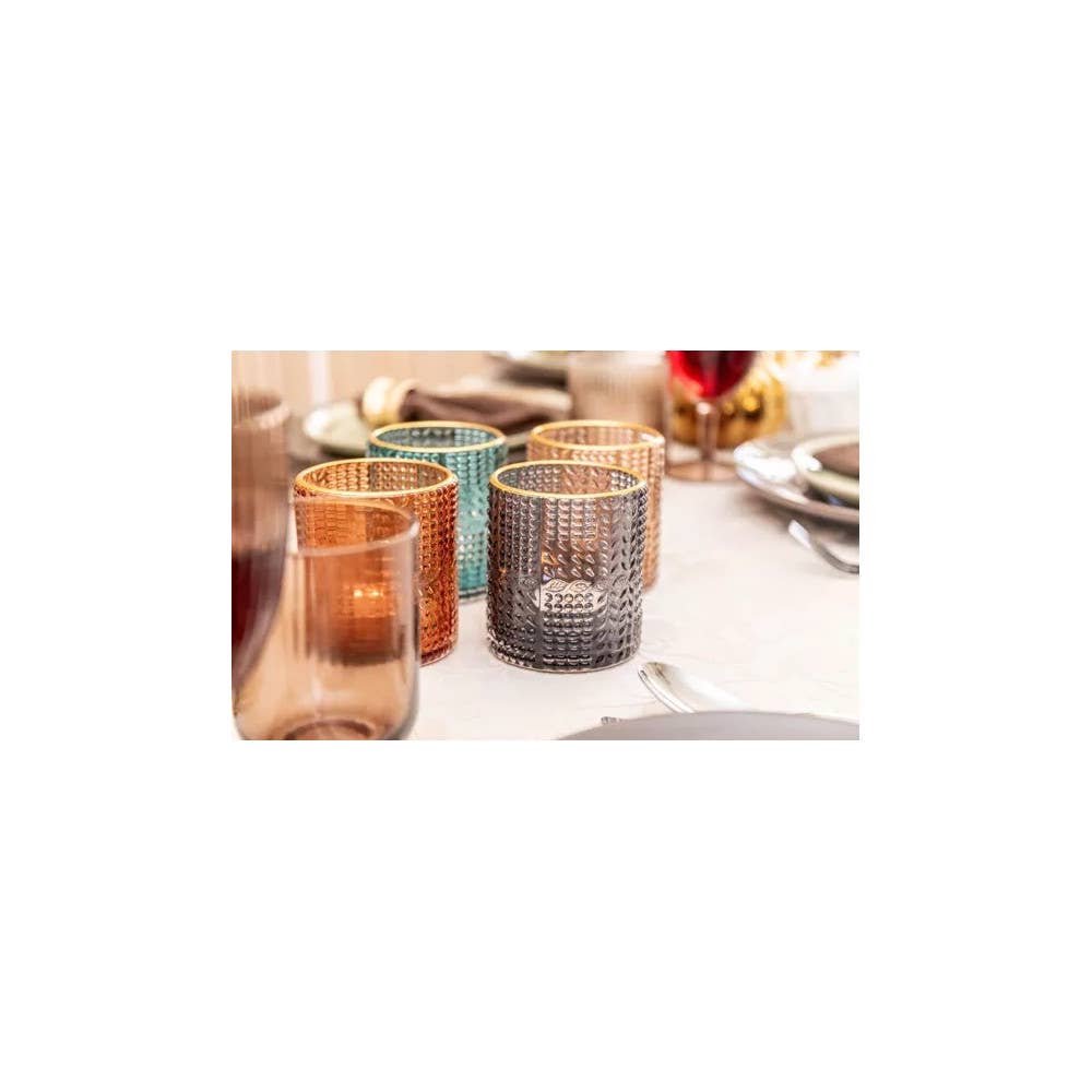 Juego de 4 portavelas de vidrio en 4 colores con bordes dorados 8x8x9 cm